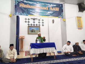 Ustadz Naman Damanik, S.Pd.I., menyampaikan tausiah maulid (sumber: Superman)