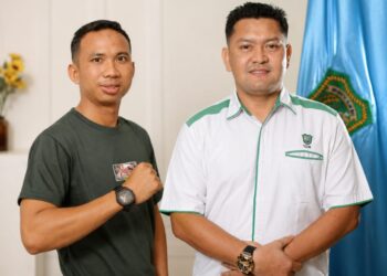 Milenial Alfa Syahputra, S.M., M.M dan Akademisi Fakultas Ilmu Sosial dan Ilmu Politik Universitas Islam Riau (FISIPOL UIR), Dr. Muhammad Arsy Ash Shiddiqy